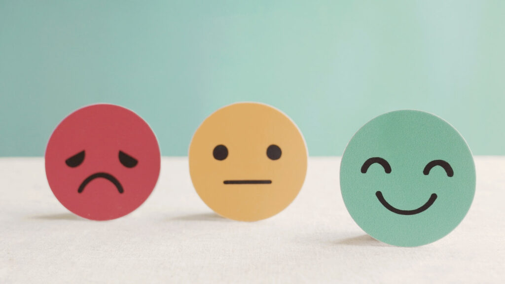 red, yellow and green smiley faces