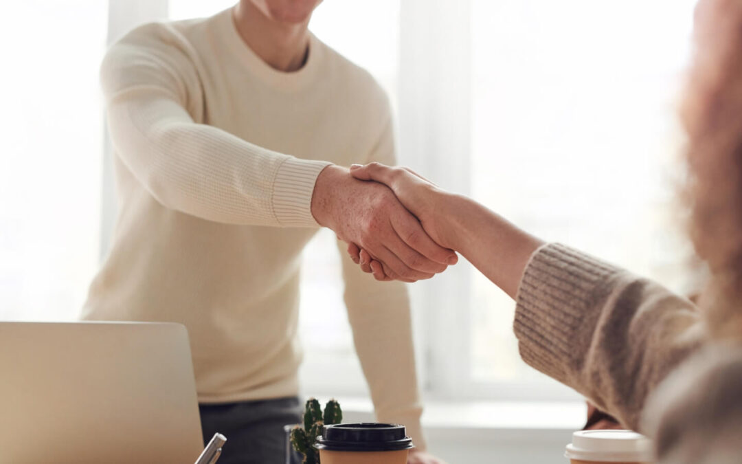 two people shaking hands