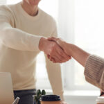 two people shaking hands