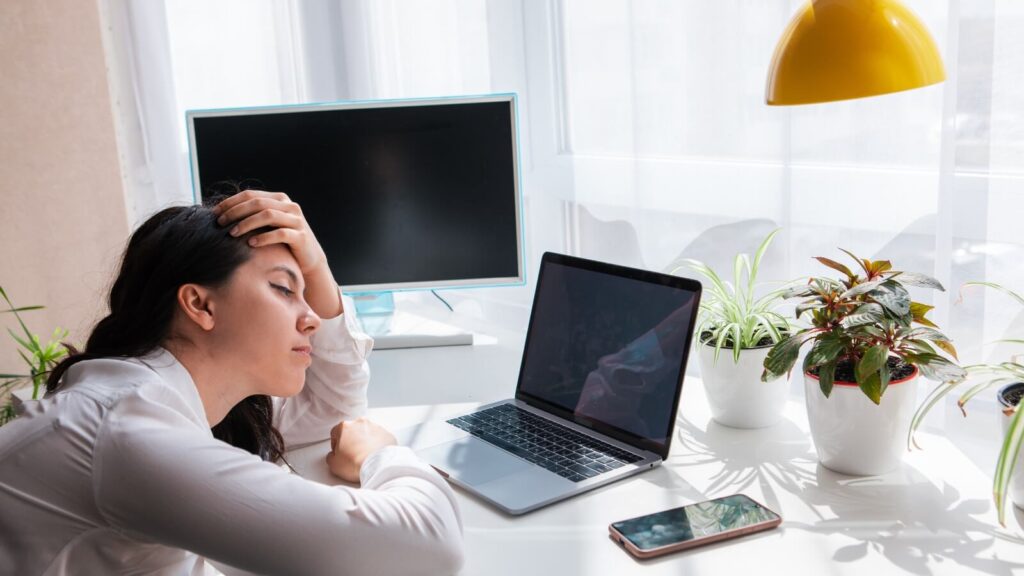 woman sitting at a computer