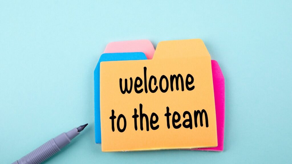 Post-It notes with the words "Welcome to the Team"