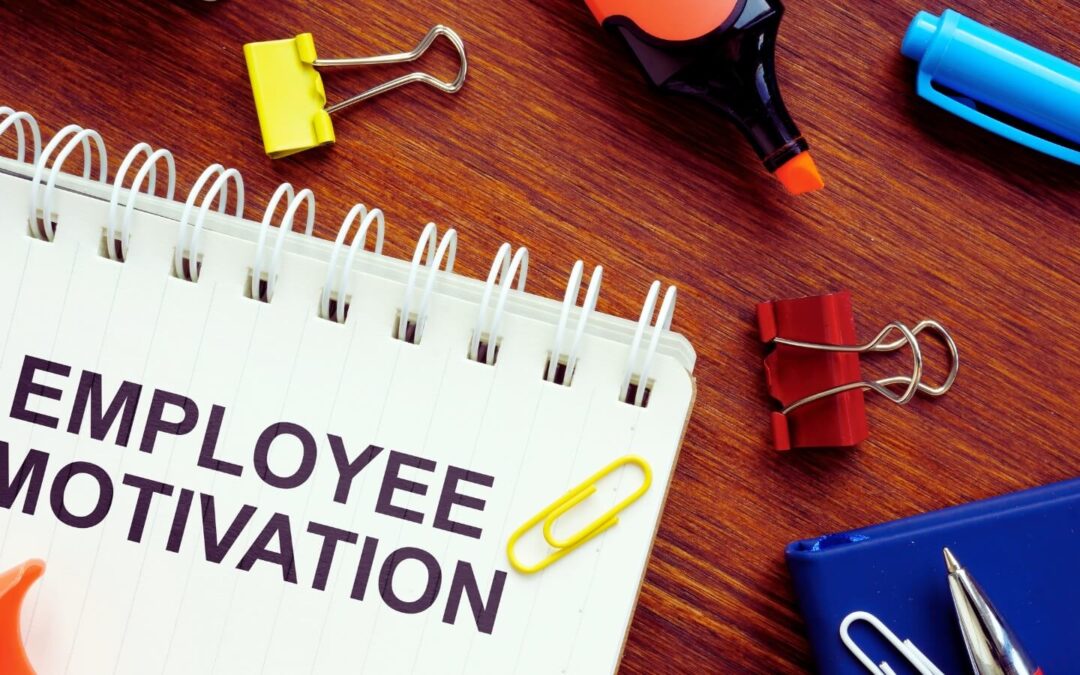 employee motivation typed on a notebook