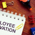 employee motivation typed on a notebook